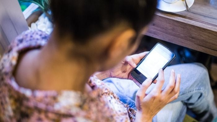 woman using phone